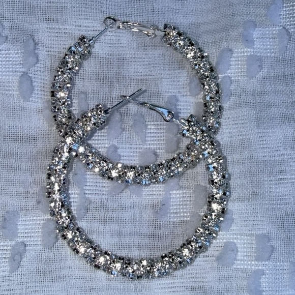 Large Bright Sparkle Rhinestone Covered Silver
Hoop Earrings - Picture 1 of 5